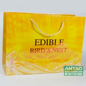 Mẫu túi giấy cao cấp màu đỏ sẫm có ép kim vàng sang trọng dùng để đựng hộp yến sào.